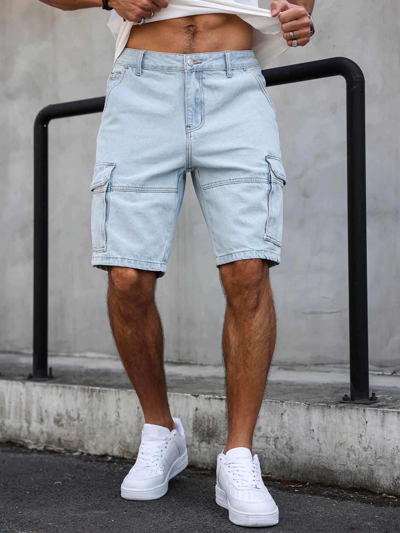 summer light blue regular denim shorts. In a utility style. With a multi-pocket design. Casual street style. Men's jeans