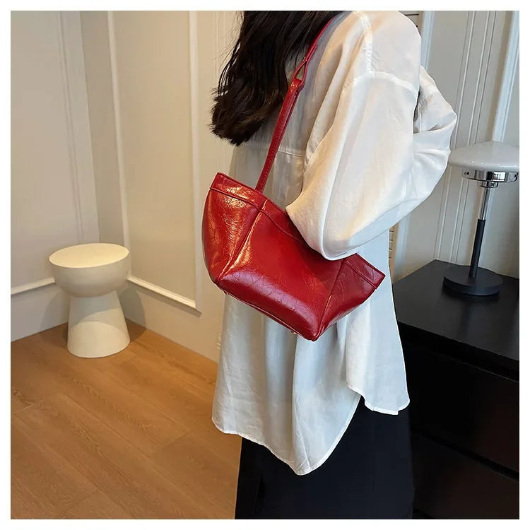 Design Sense Red Women New 2024 Fashion Texture Shoulder Bag Popular Popular Hand Tote Bags for Women Handbags Red Purse Bolsa