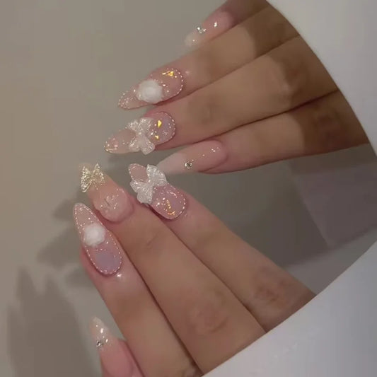 24pcs Pink White Girl Wearing Fake Nails with 3D Bow Design Shiny Pink French False Nails Wearable Full Cover Press on Nails