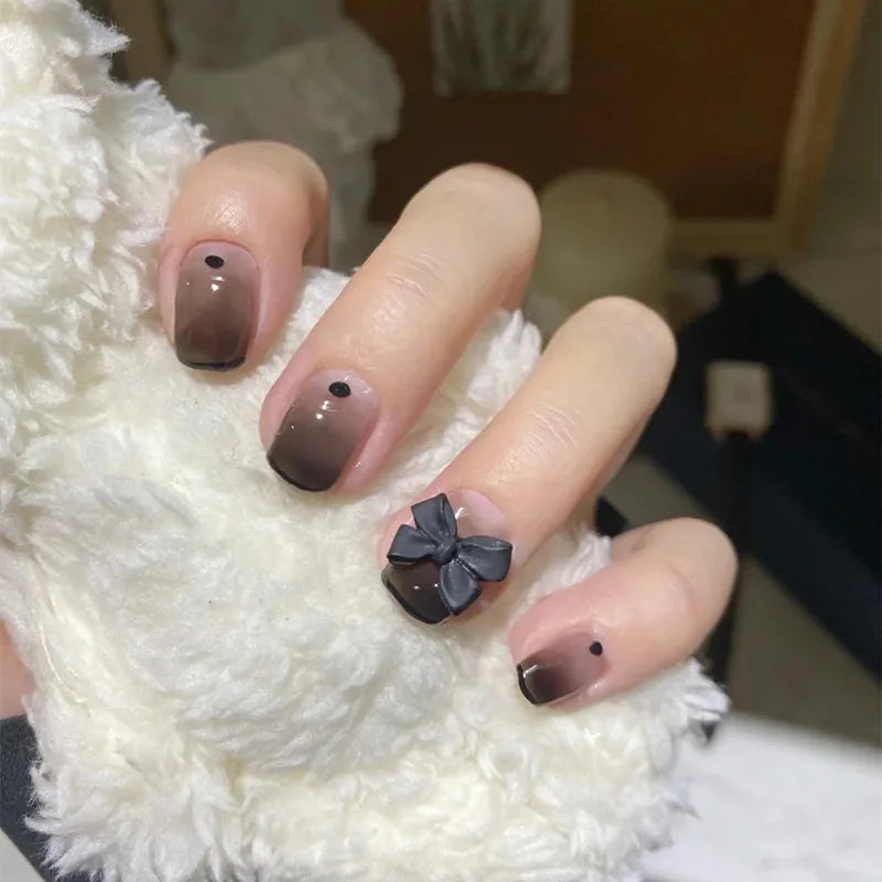 Short French Fake Nails Black Bow Design Press on Nail Tips with Glitter Love Heart Pattern Artificial Nail Tips for Girls 24pcs