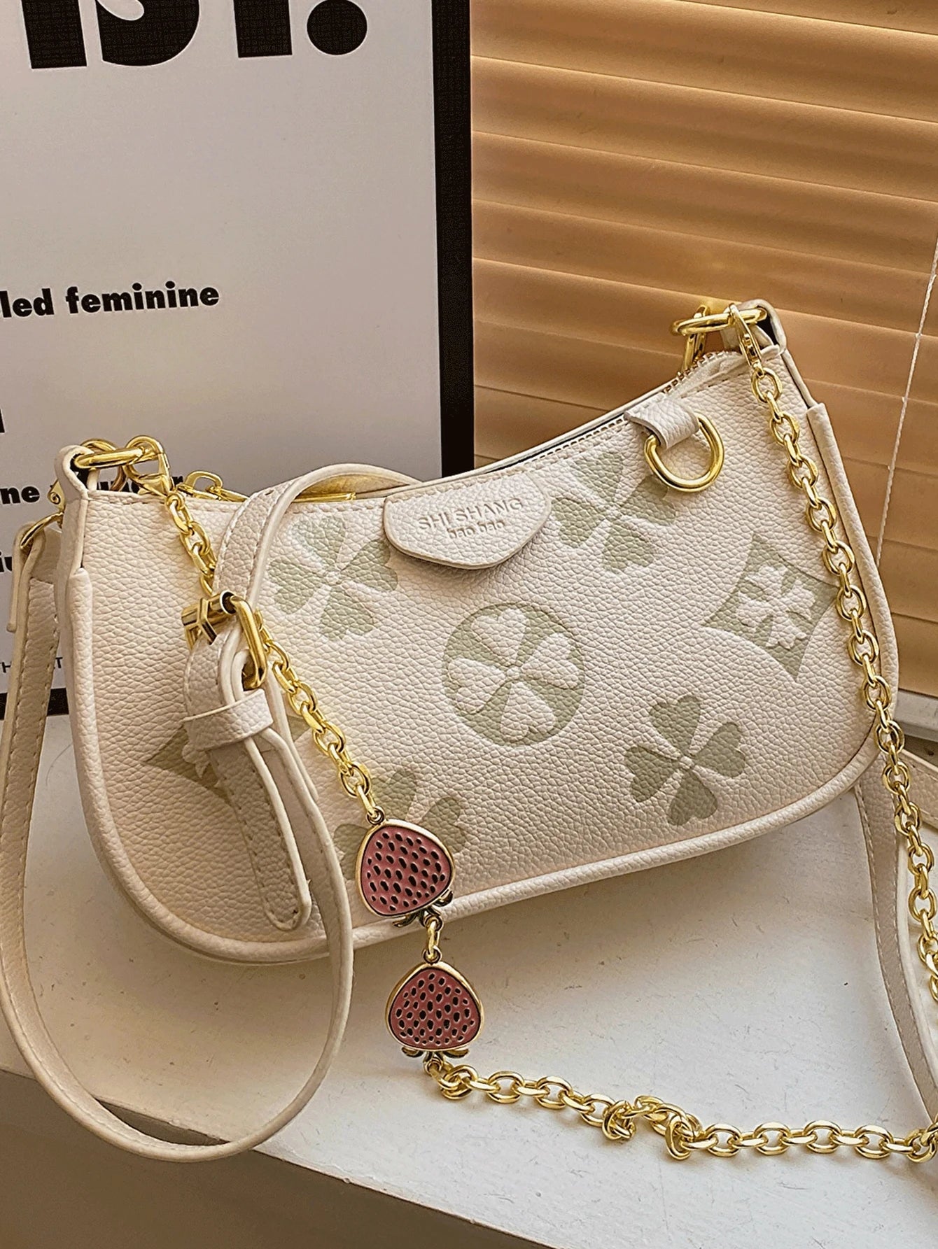 In 2024, the new fashion classic Joker body print pattern design metal chain decoration design underarm baguette bag is suitable