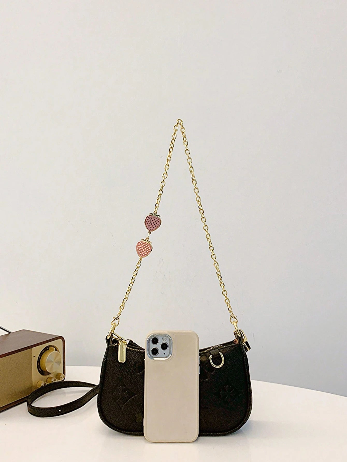 In 2024, the new fashion classic Joker body print pattern design metal chain decoration design underarm baguette bag is suitable
