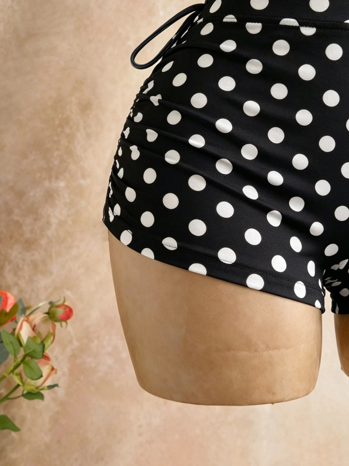 Classic Black and White Polka Dot Jumpsuit with Halter Neck, Tie Straps, Deep V-Cut Chest, Hollow-Out Design + Drawstrings on Both Sides, High-Waisted, Tummy Control, and Covers the Thigh Area