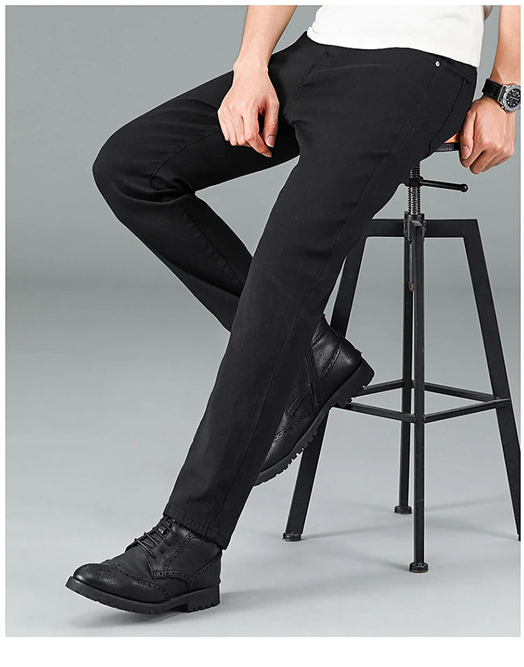 Men's pure black jeans Korean version trendy straight fit pants men's comfortable and elastic classic business denim