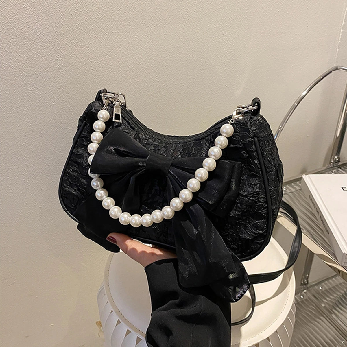White folds pop retro bow bag Female Pearl handle New fashion pearl armpit shoulder crossbody bag 1 outfit