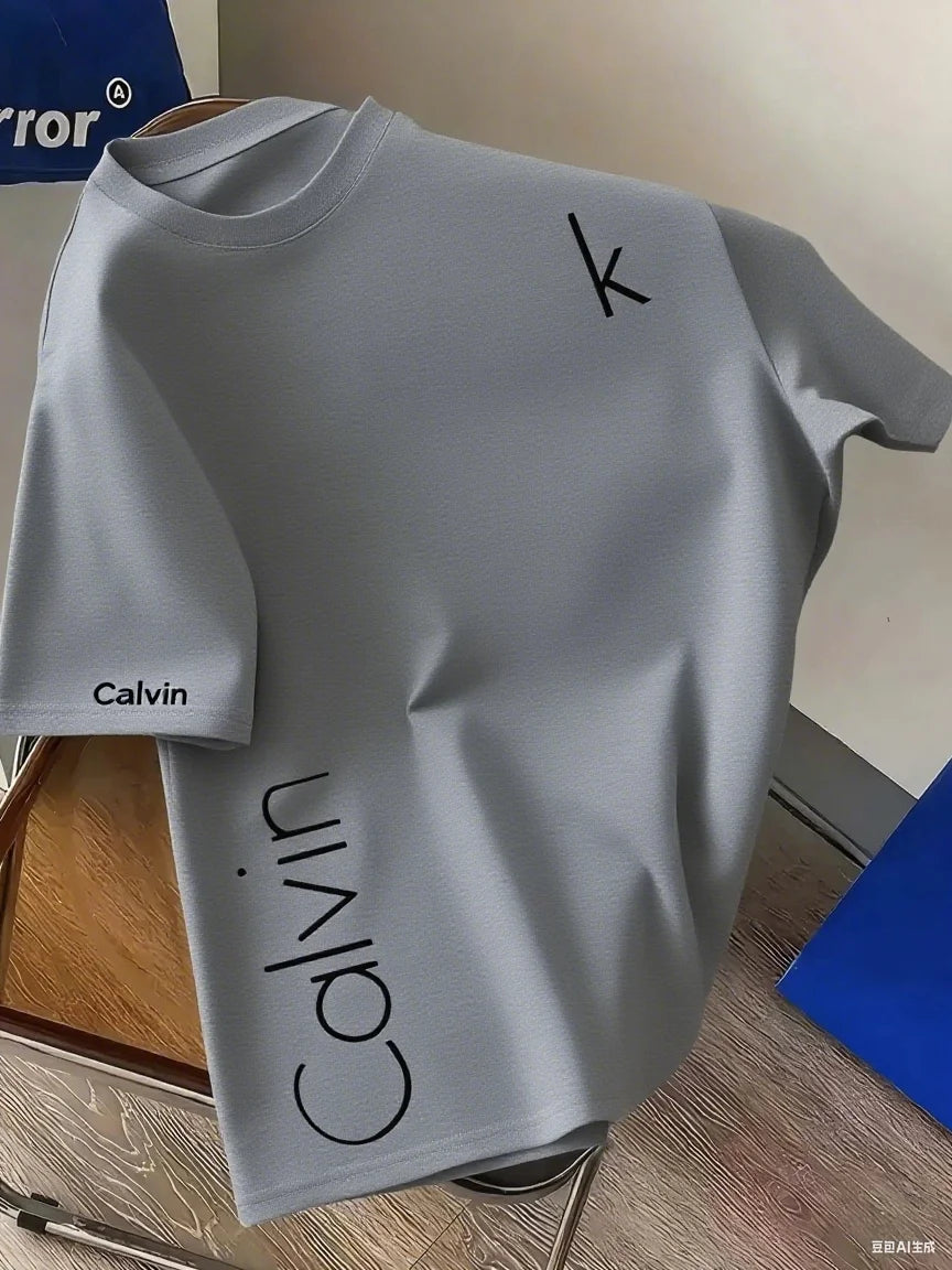 The latest CK letter creative mesh round-neck T-shirt with a fashionable positioning and printing in 2025 is a quick-drying garm