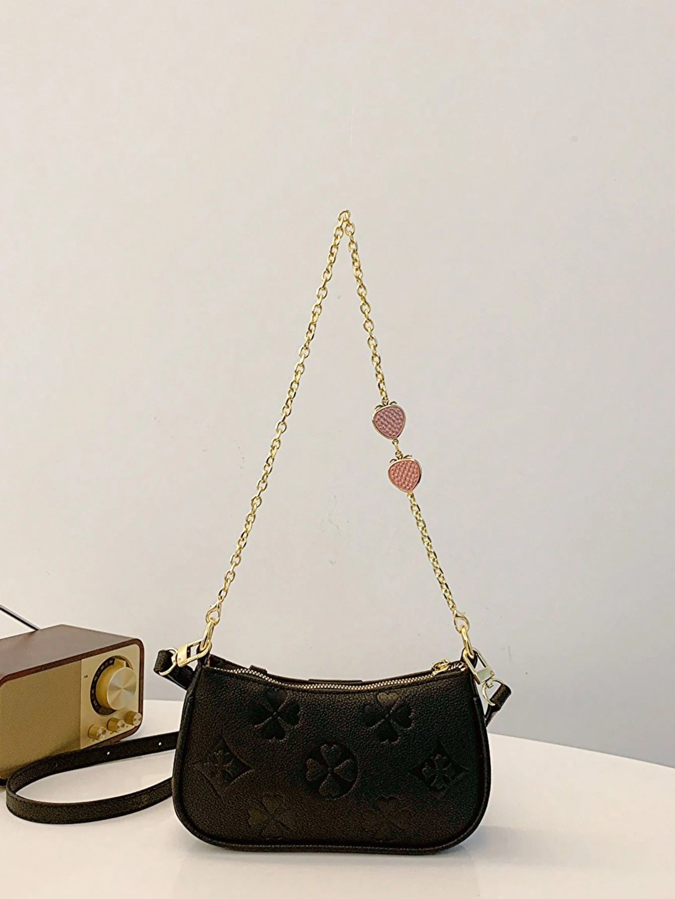 In 2024, the new fashion classic Joker body print pattern design metal chain decoration design underarm baguette bag is suitable