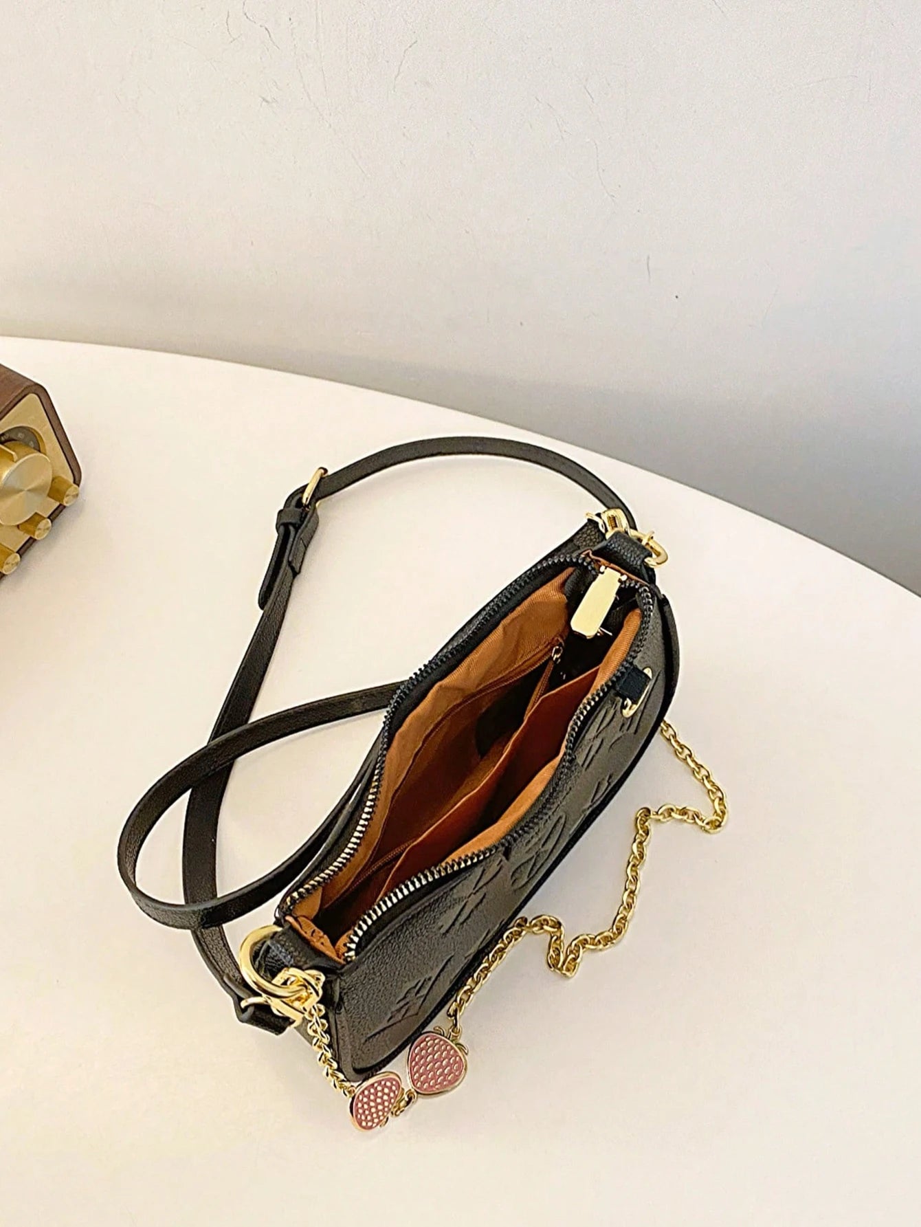 In 2024, the new fashion classic Joker body print pattern design metal chain decoration design underarm baguette bag is suitable