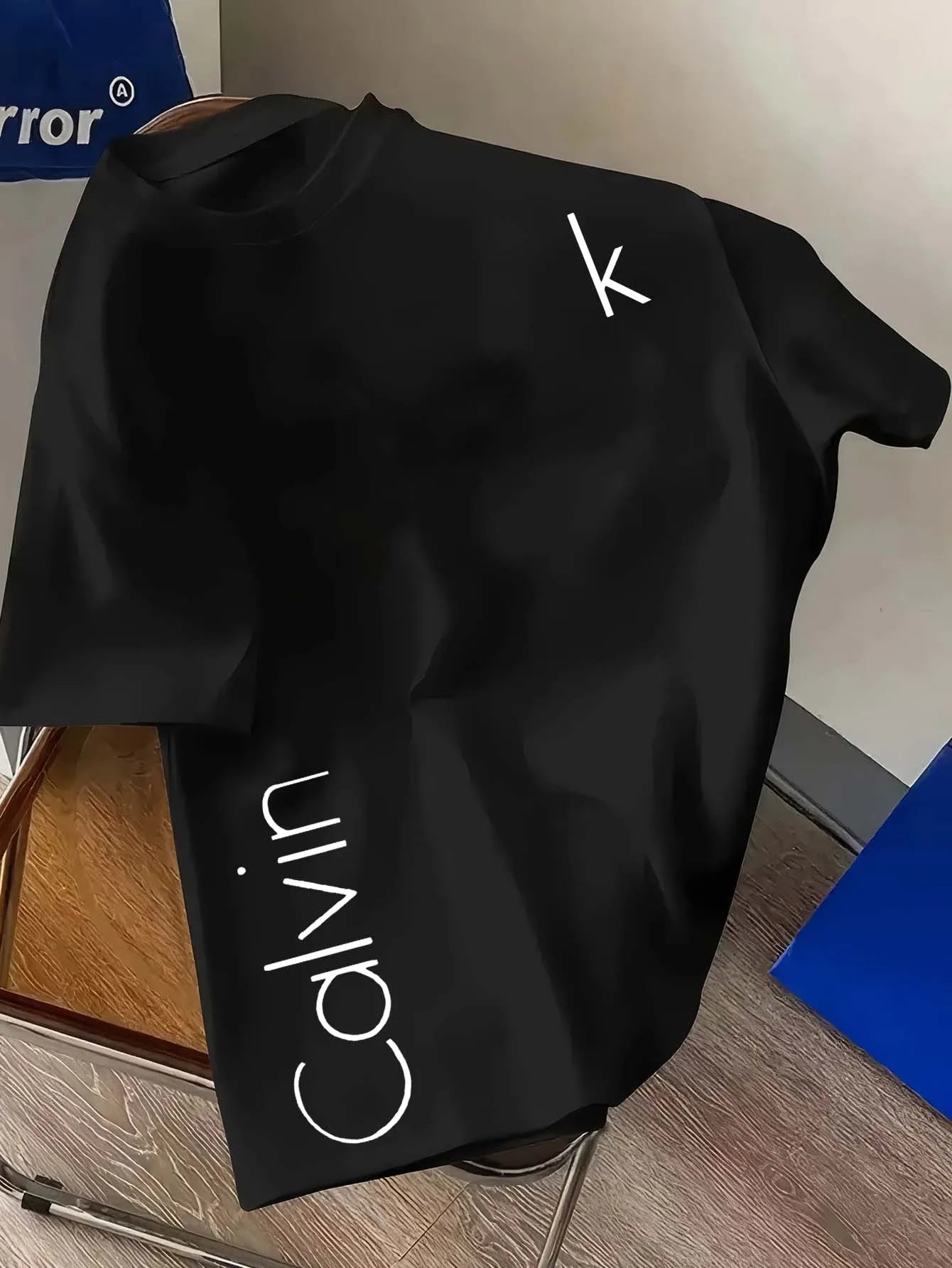 The latest CK letter creative mesh round-neck T-shirt with a fashionable positioning and printing in 2025 is a quick-drying garm