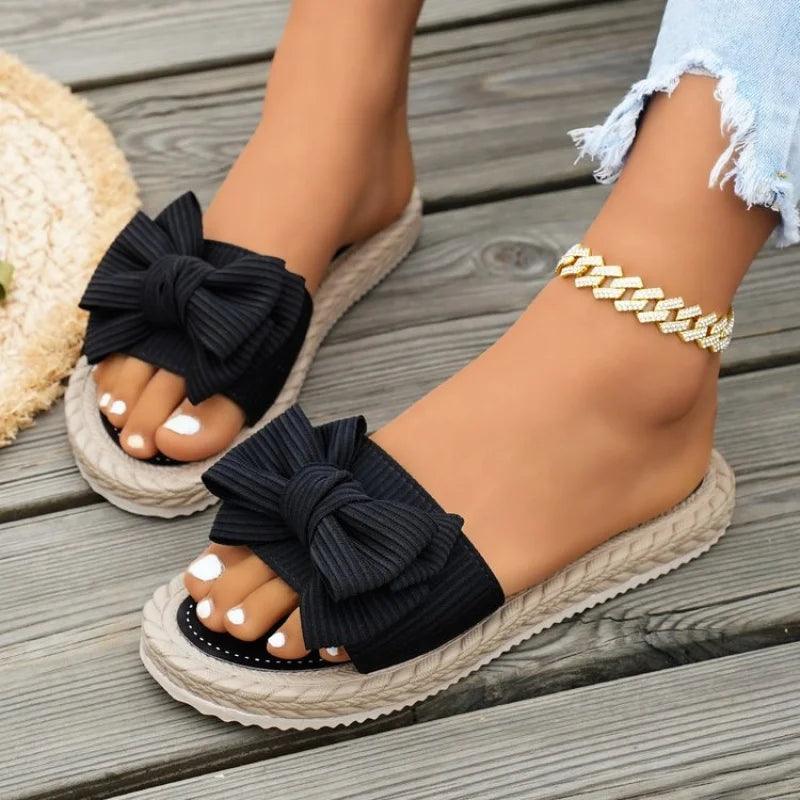 Women's Slip-On Flat Sandals Feature a Soft Sole and Upper Design, And Decorated with Bow Details, Both Stylish and Versatile