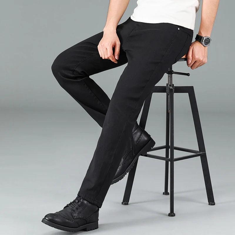 Men's pure black jeans Korean version trendy straight fit pants men's comfortable and elastic classic business denim