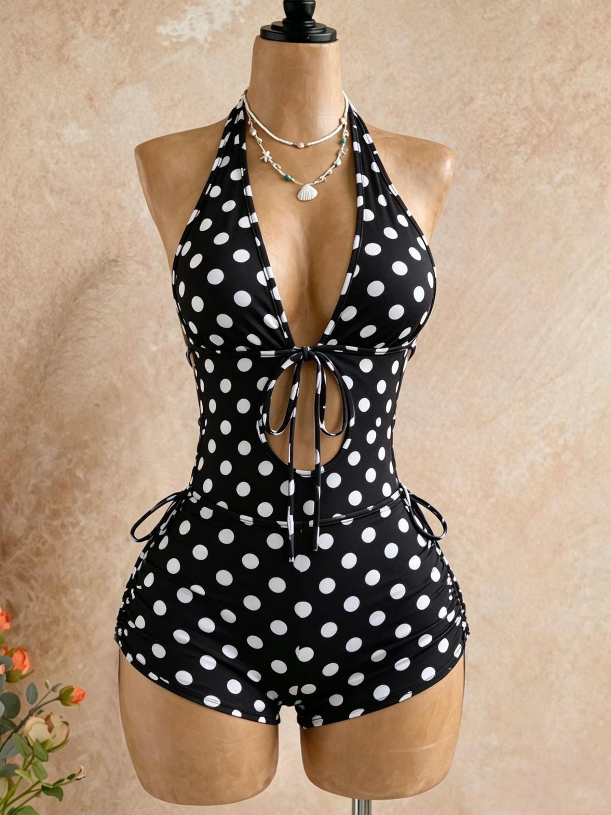 Classic Black and White Polka Dot Jumpsuit with Halter Neck, Tie Straps, Deep V-Cut Chest, Hollow-Out Design + Drawstrings on Both Sides, High-Waisted, Tummy Control, and Covers the Thigh Area