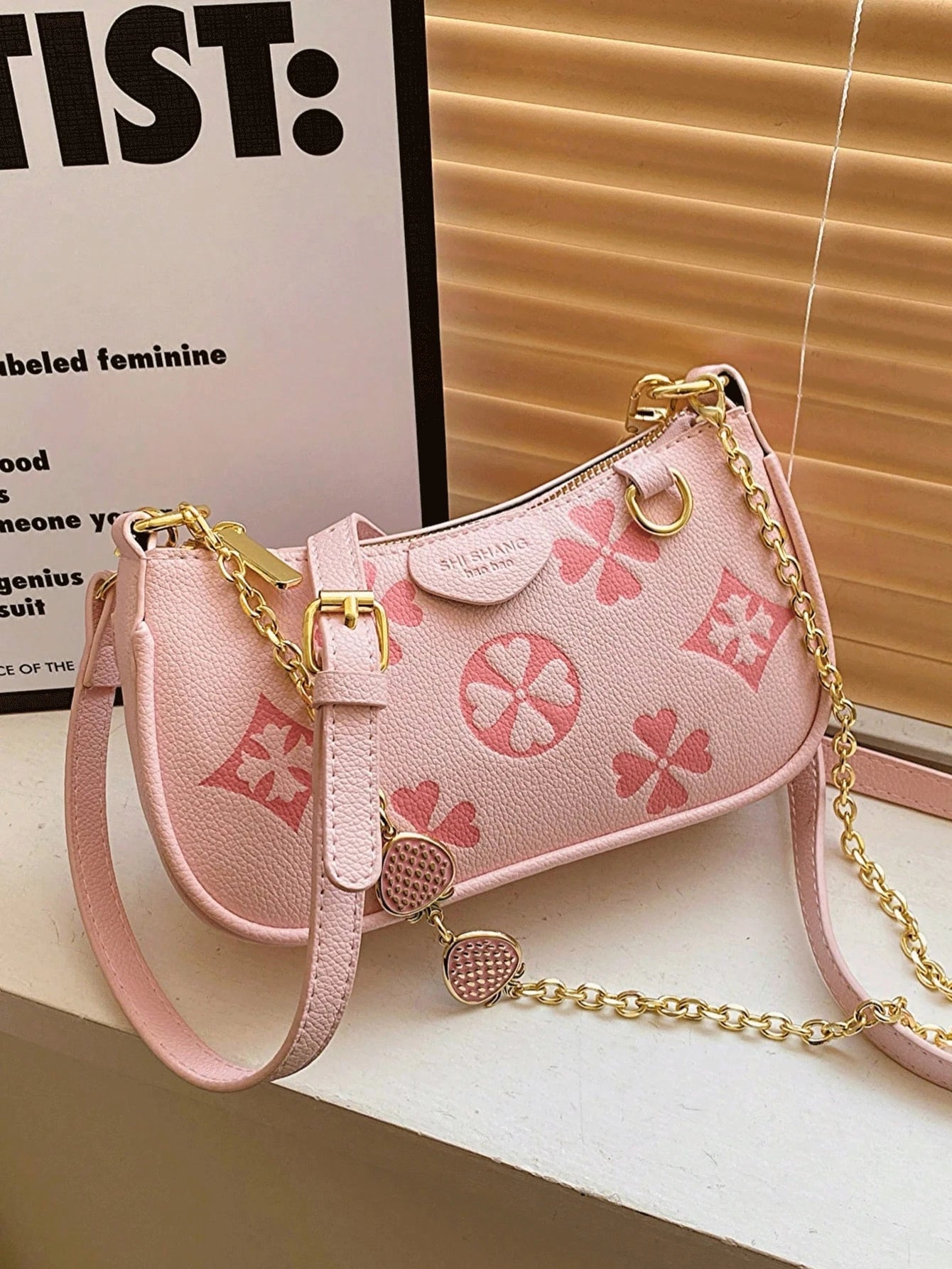 In 2024, the new fashion classic Joker body print pattern design metal chain decoration design underarm baguette bag is suitable