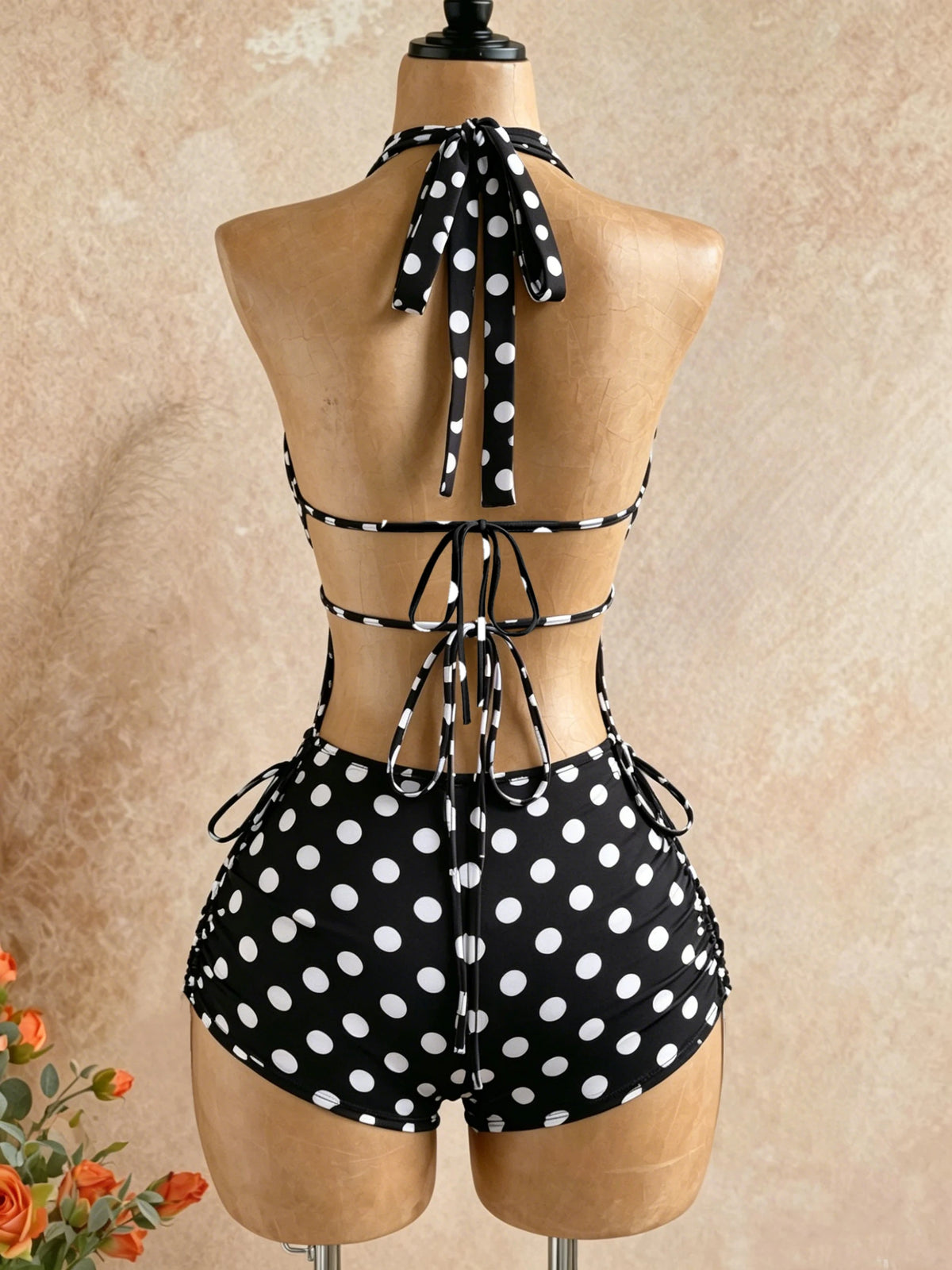 Classic Black and White Polka Dot Jumpsuit with Halter Neck, Tie Straps, Deep V-Cut Chest, Hollow-Out Design + Drawstrings on Both Sides, High-Waisted, Tummy Control, and Covers the Thigh Area
